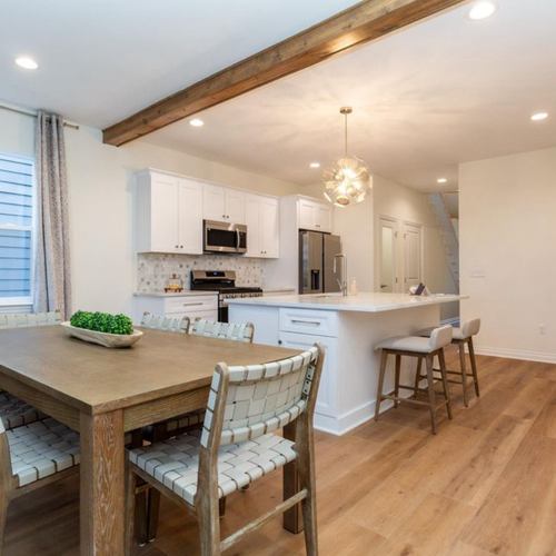 Modern dining room with hardwood flooring