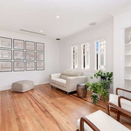 Living room with hardwood flooring by Luxx Flooring in Macomb, MI