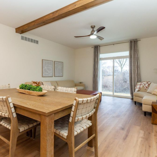 Modern dining room with hardwood flooring