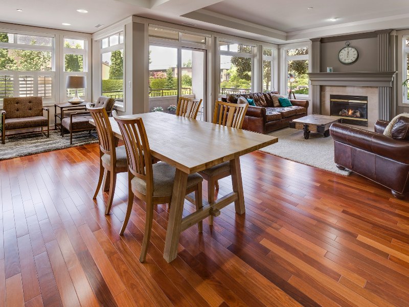 Warm brown hardwood flooring in a dining room