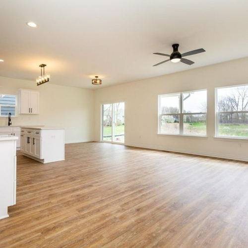 Hardwood floors in a kitchen by Luxx Flooring